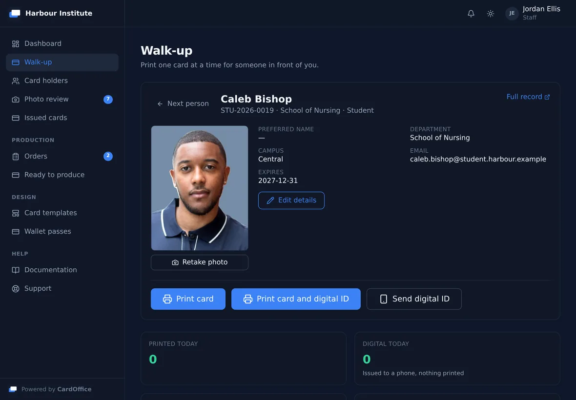The counter screen on an iPad: Caleb Bishop's record with his photograph, his details, and buttons to print the card, print the card with a digital ID, or send a digital ID.